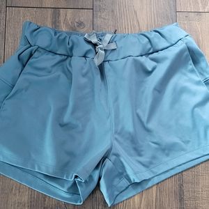 Teal running shorts